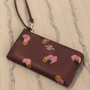 Purple floral Coach wallet with wristlet